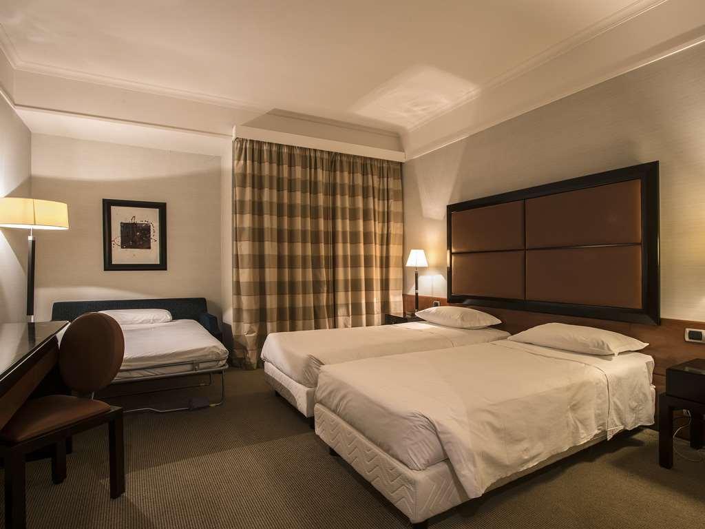 בולוניה Flyon Hotel & Conference Center חדר תמונה Room at the hotel